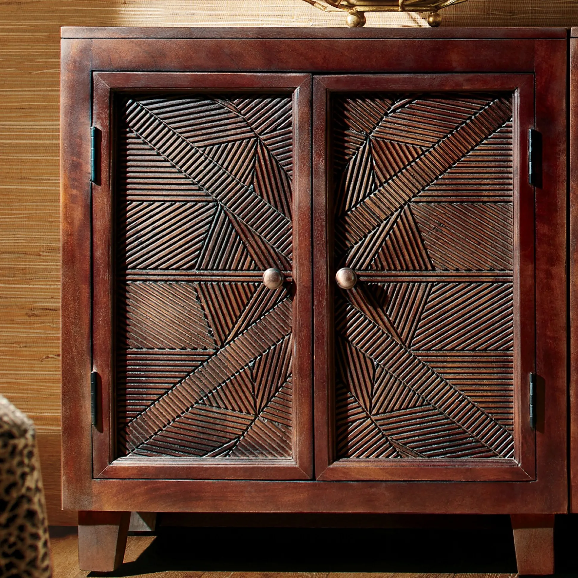 Crossed Carved Cabinet