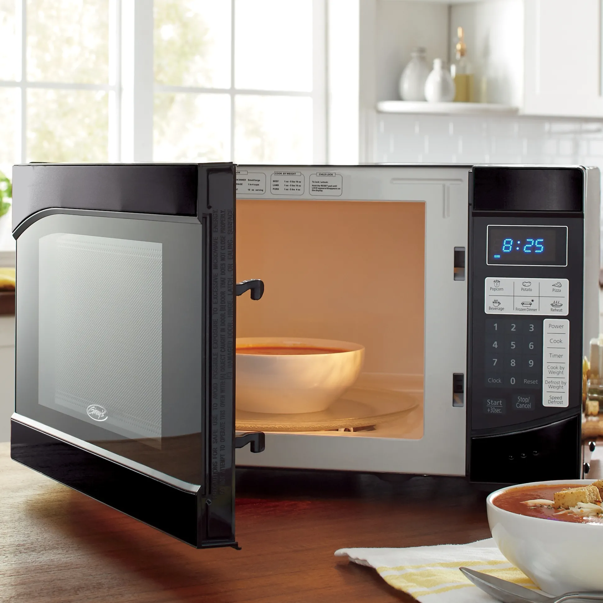 Ginny's .9 Cu. Ft. Metallic Microwave