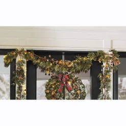 Lit Frosted Garland with Pinecones and Bow