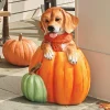 Ottie the Outdoor Pup in a Pumpkin Statue